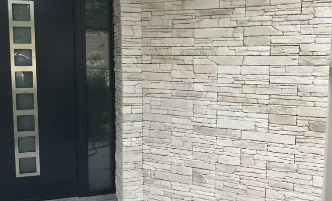 Pose d'un parement pierre sur une villa à Saint Genest-Lerpt, Veauche, REFAC